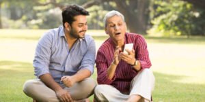 An emotional moment between a son and his aging parents, symbolizing healthy ageing, vibrant living, and care.”