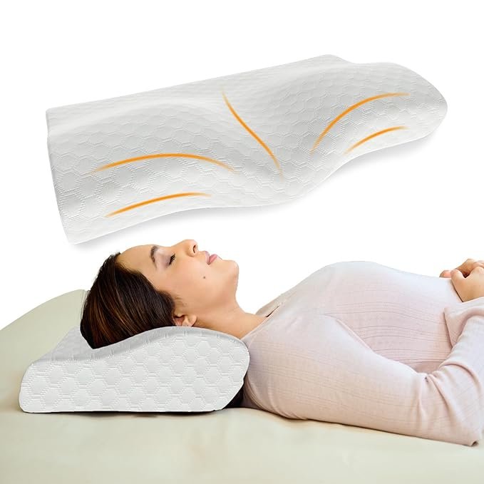 Orthopedic memory foam pillow supporting woman’s neck while sleeping