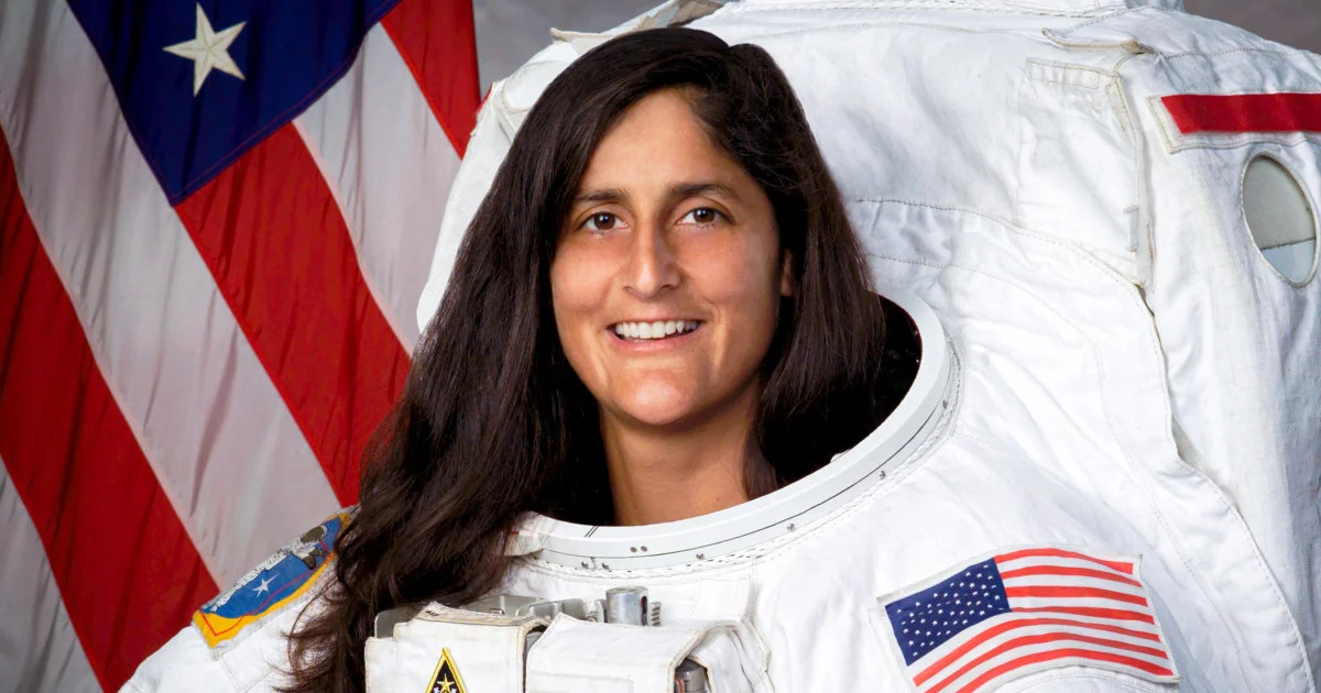 “Sunita Williams standing confidently in her astronaut suit, symbolizing that age is just a number.”